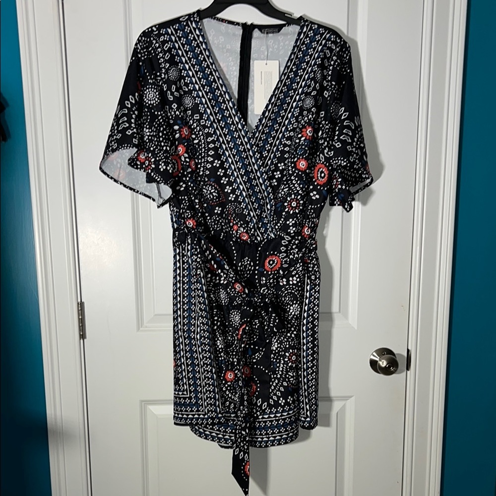 BloomChic Black and White Romper with Red Details